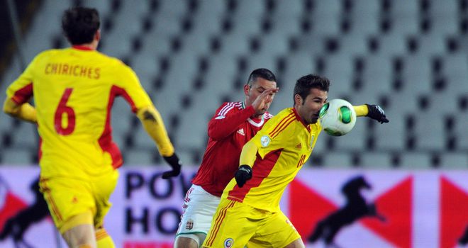 Battle: Adrian Mutu and Norbert Meszaros vie for the ball in 2-2 draw