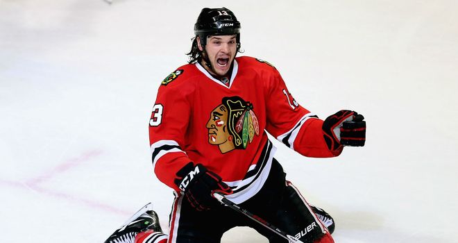 Daniel Carcillo celebrates his game-winning goal for the Chicago Blackhawks