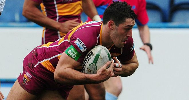 Joe Wardle: Huddersfield centre defended by Paul Anderson