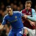 Jack Collison challenges Frank Lampard in the London derby