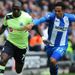 Moussa Sissoko is in a race with Jean Beausejour at the DW Stadium