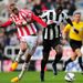 Stoke's Steven Nzonzi battles for the ball with Newcastle midfielder Moussa Sissoko at St James' Park