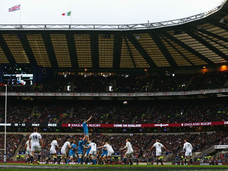 Full house: The crowd roar on the teams at Twickenham