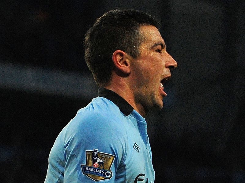 Kolarov celebrates his goal