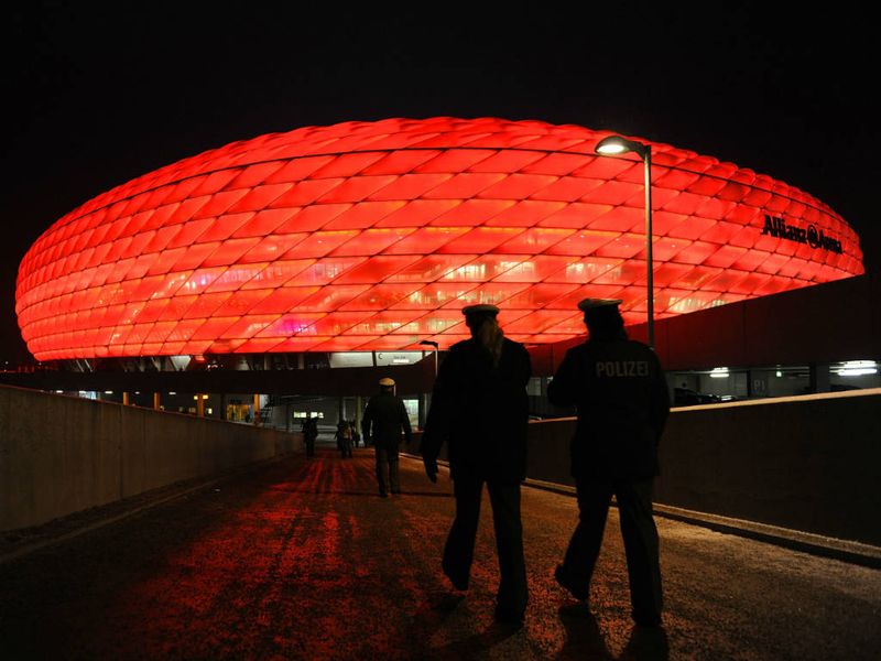 An illuminating view of the Allianz Arena from outside the stadium