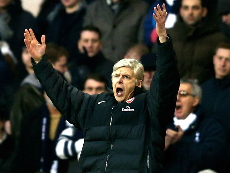 Wenger shows his frustration after watching his Gunners side suffer defeat against their neighbours