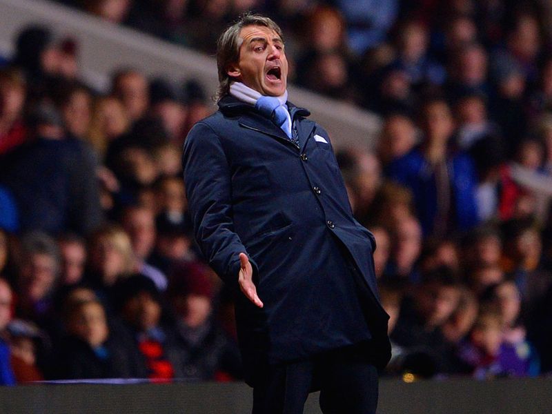 Roberto Mancini gestured as his side pressed for a second goal.