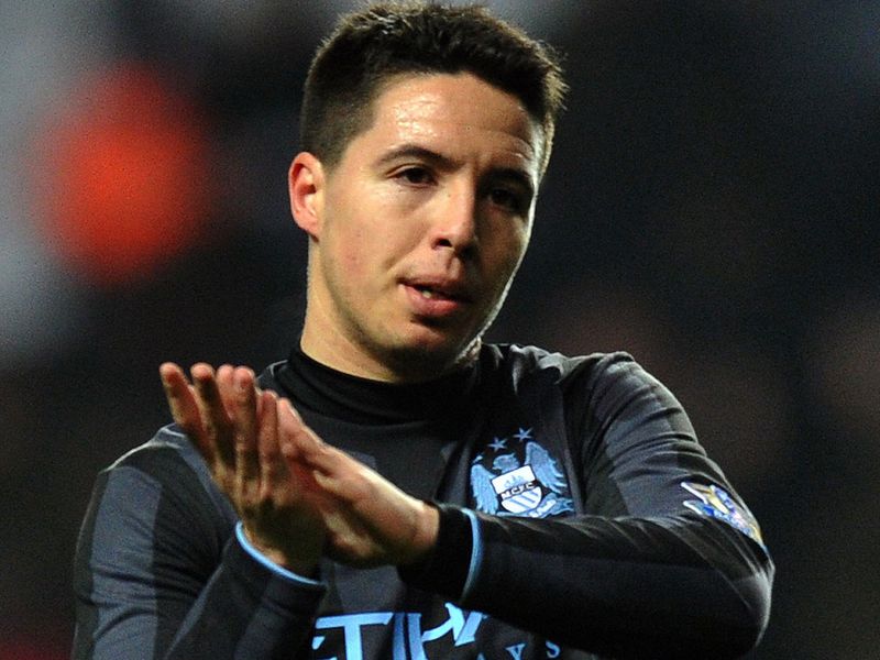 City held on for a 1-0 win, closing the gap on Man United to 12 points as Samir Nasri applauded the visiting fans at the final whistle.