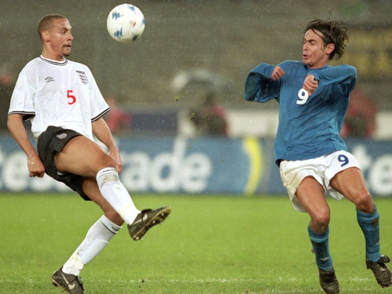 The centre-back, in action here against Filippo Inzaghi of Italy, is left out of the squad for Euro 2000 by Kevin Keegan