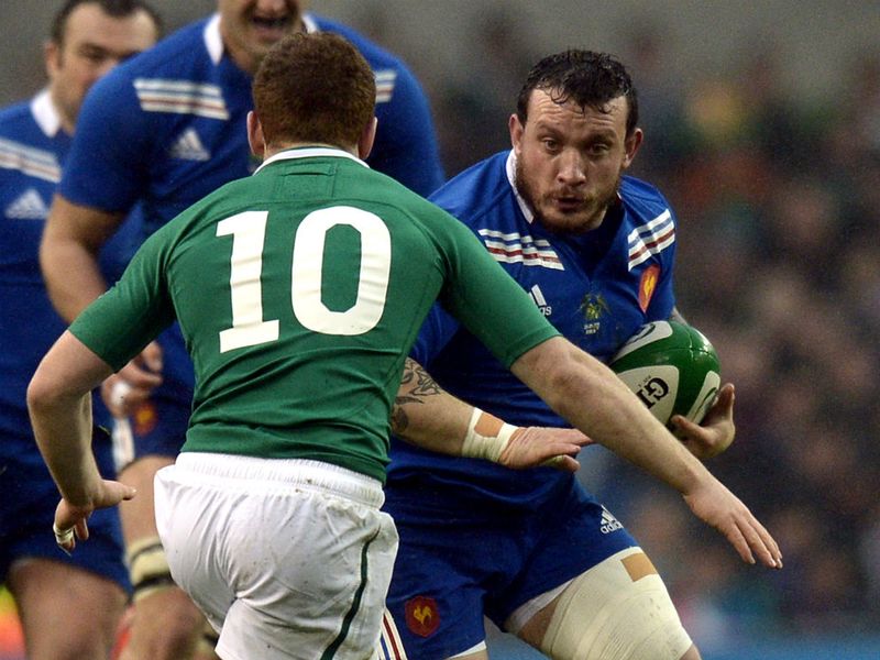 Fully concentrating: France's loose head prop Thomas Domingo vies with Ireland's fly-half Paddy Jackson