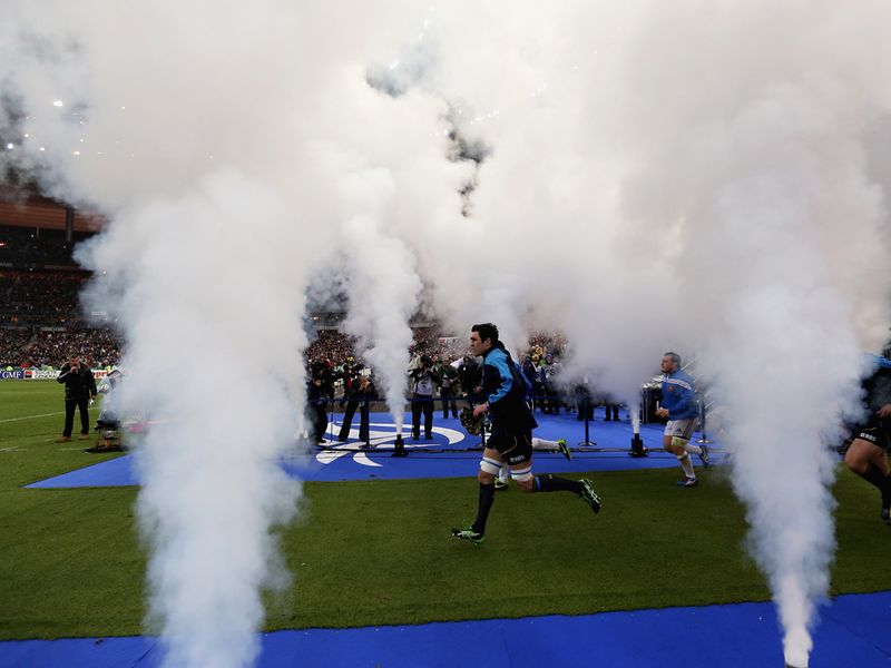 Making an entrance: Kelly Brown runs out on to the pitch