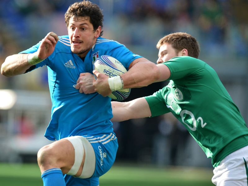 Stopped in his tracks: Alessandro Zanni is tackled by Iain Henderson