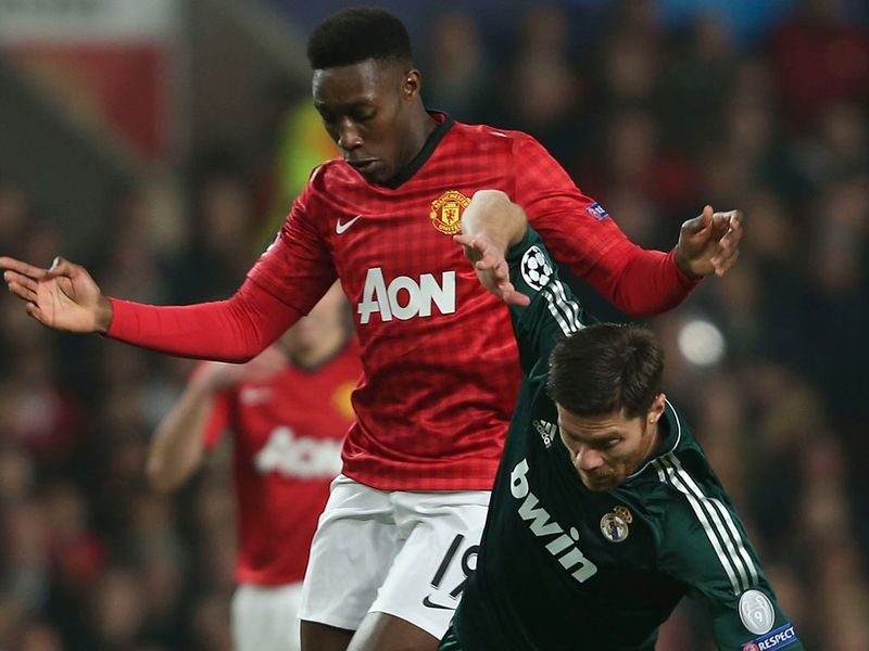 Danny Welbeck starts at the expense of Wayne Rooney, as he battles with Xabi Alonso for possession