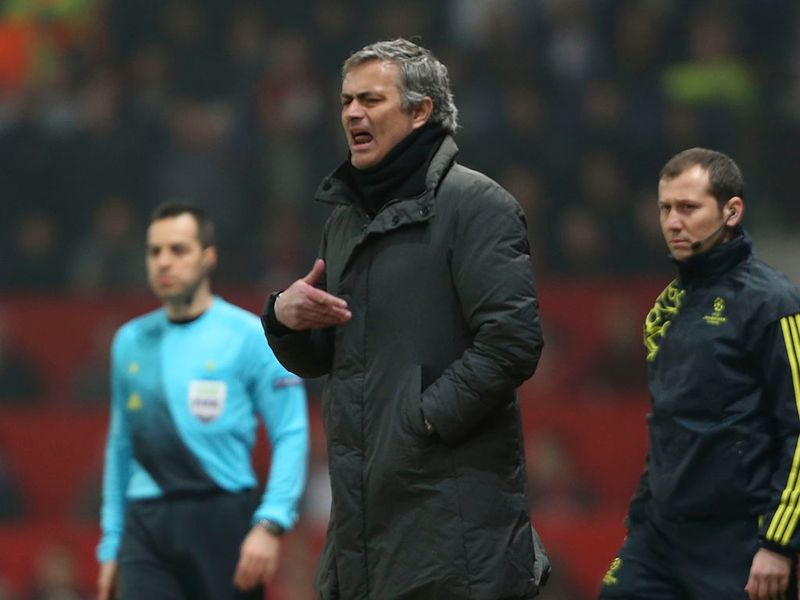 Jose Mourinho communicates with his players, knowing his side need to score if they want to progress to the Champions League quarter-finals.
