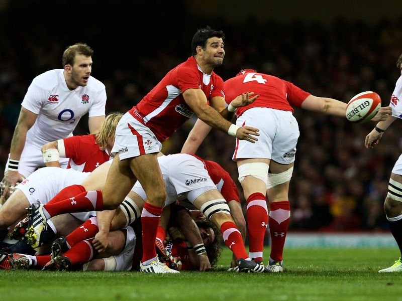 Quick ball: Mike Phillips gets his pass out wide out during the early stages