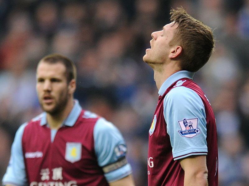 Nathan Baker is dejected as his own goal gives Reading the lead against Aston Villa