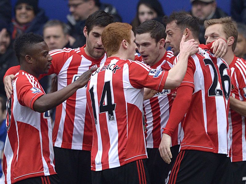Steven Fletcher is mobbed after netting at Loftus Road