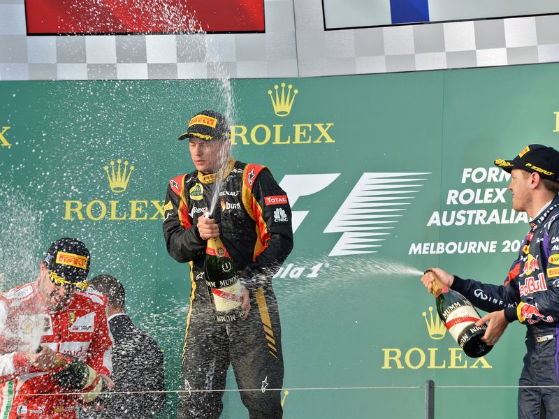 Kimi Raikkonen celebrates his win