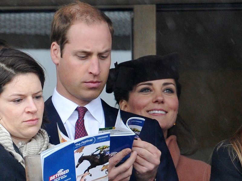 The Duke and Duchess of Cambridge study the form