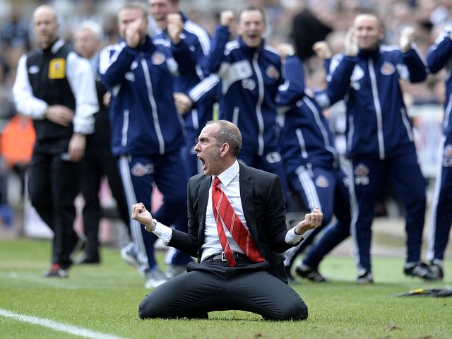 Paulo Di Canio slides on his knees to celebrate the second goal