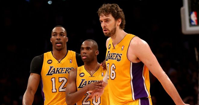 Dwight Howard, Jodie Meeks and Pau Gasol celebrate for the LA Lakers