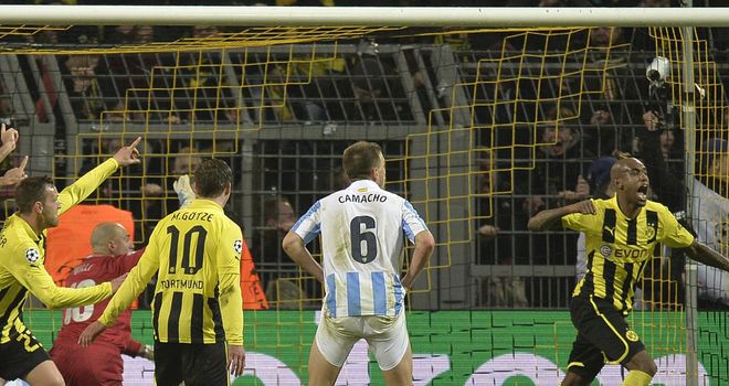 Borussia Dortmund's Felipe Santana scores the dramatic winner deep into stoppage time. Borussia Dortmund's Felipe Santana scores the dramatic winner deep into stoppage time.