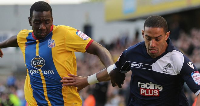 Yannick Bolasie and Liam Feeney: Battle for the ball at The Den