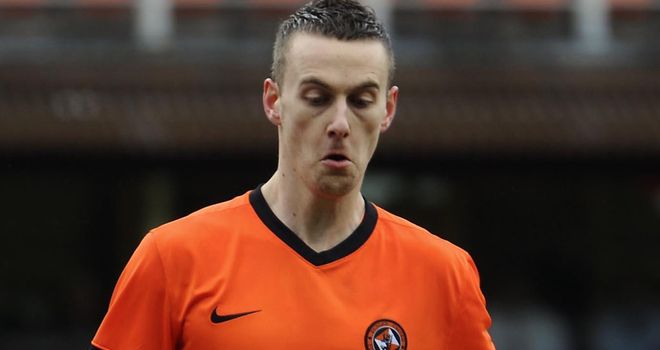 Rory Boulding's last-gasp winner sent Dundee United into the top half of the SPL table