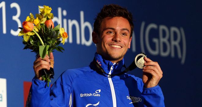 Tom Daley celebrates his victory in Edinburgh