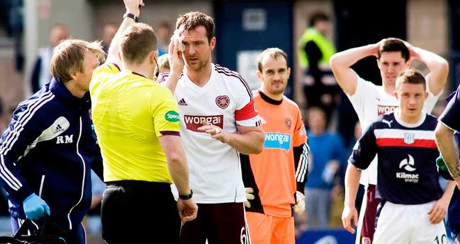 Hearts skipper Andy Webster is dismissed against Dundee