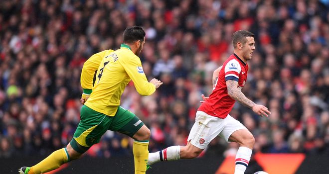Jack Wilshere returned to action as Arsenal left it late to see off Norwich
