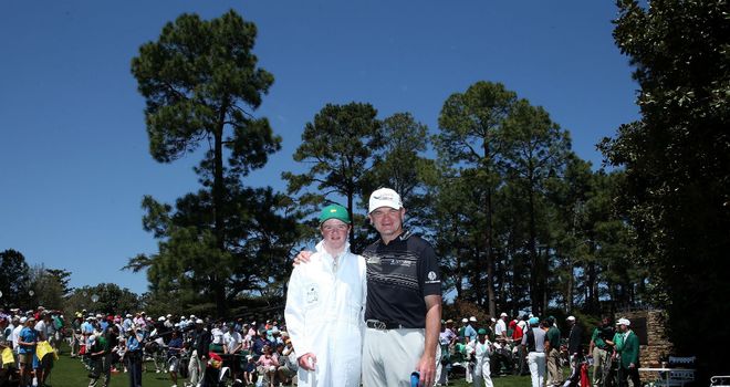 Paul Lawrie: Poses with son Michael during the Par-3 Contest at Augusta on Wednesday