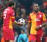 Johan Elmander hands the ball to Didier Drogba, one of Galatasaray's scorers in their heroic defeat