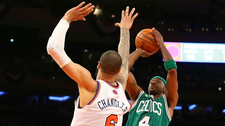 son Terry shoots against the New York Knicks