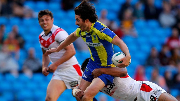 Warrington's Stefan Ratchford is tackled by Sia Soliola