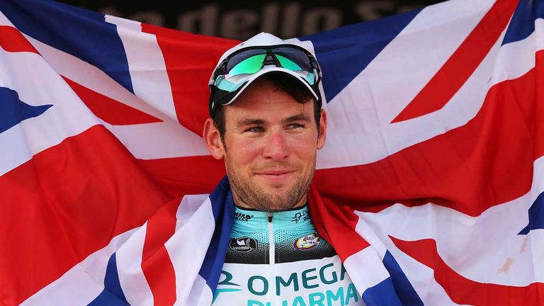 Mark Cavendish celebrates with the Union Jack after victory in Naples