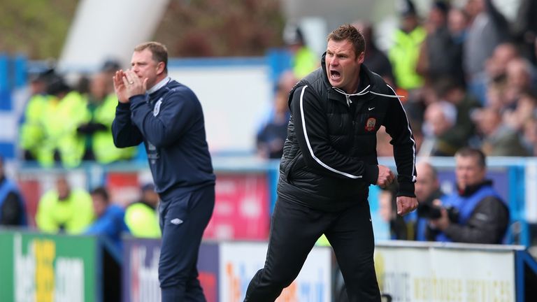 Mark Robins (L) praise for match-winner James Vaughan