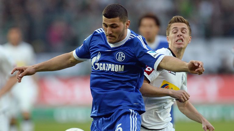 Patrick Herrmann and Sead Kolasinac tangle.
