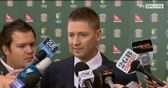Clarke throws support behind Warner