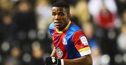Zaha return down to United