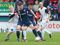 Iain Vigurs keeps possession.
