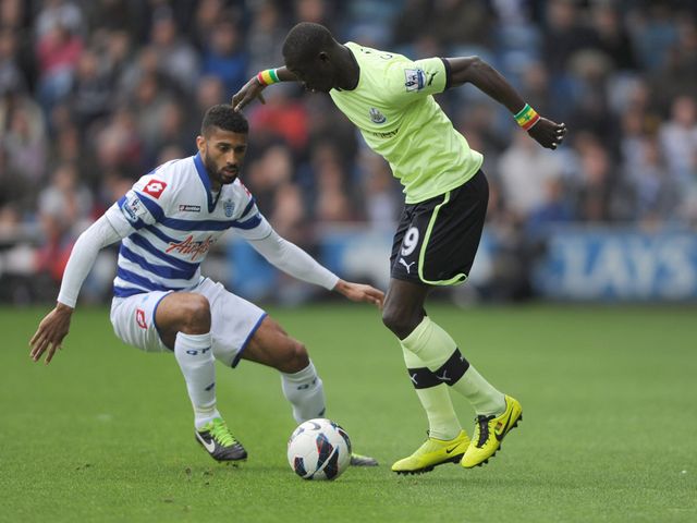 Jose Boswingwa and Papiss Cisse battle for possession
