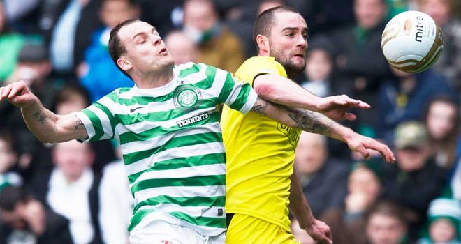 Anthony Stokes and James McPake: Duo lock horns in previous meeting between Celtic and Hibs
