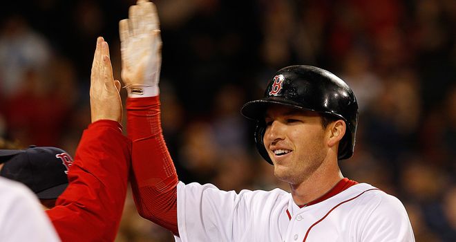 Stephen Drew celebrates his home run against the Twins