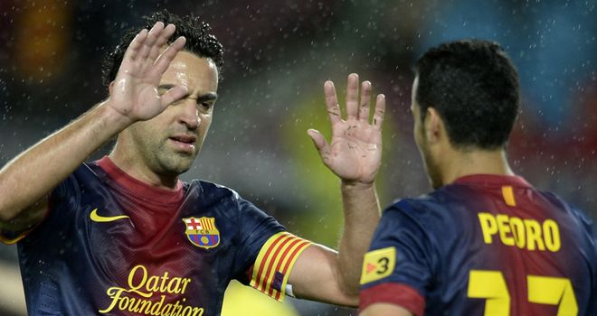 Xabi congratulates Pedro after his opening goal
