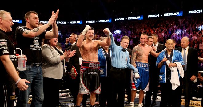 Carl Froch: Celebrates the verdict after hearing he has beaten Mikkel Kessler on points