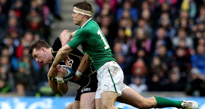 Stuart Hogg and Brian O'Driscoll tangle during this year's Six Nations campaign
