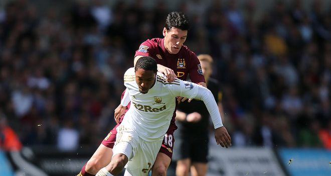 Jonathan De Guzman: Tangles for the ball with Gareth Barry