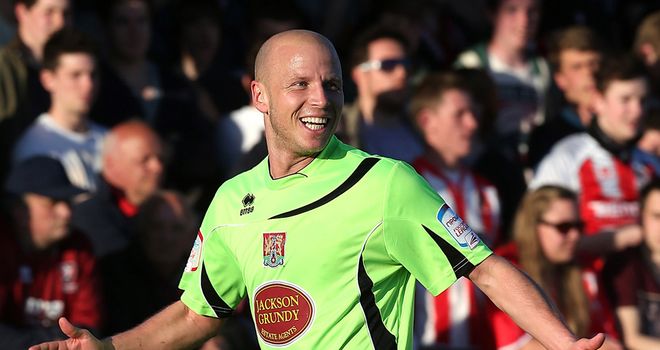 Luke Guttridge: Celebrates his stunning strike