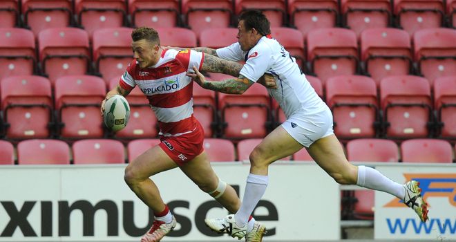 Josh Charnley charges over for a Wigan try